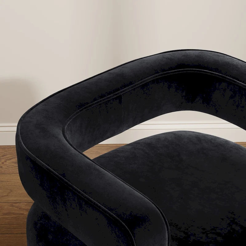 Fauteuil pivotant 360° en velours noir avec piètement doré, une place